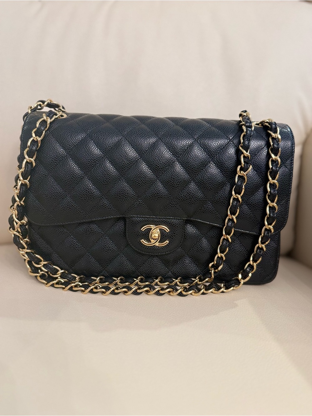 CHANEL Classic Jumbo Double Flap in Black Caviar Leather with Gold-Tone Hardware